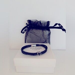 Endless Jewelry double leather bracelet with a silver heart charm.